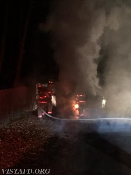 Vista Firefighters extinguishing the motor vehicle fire - December 2015