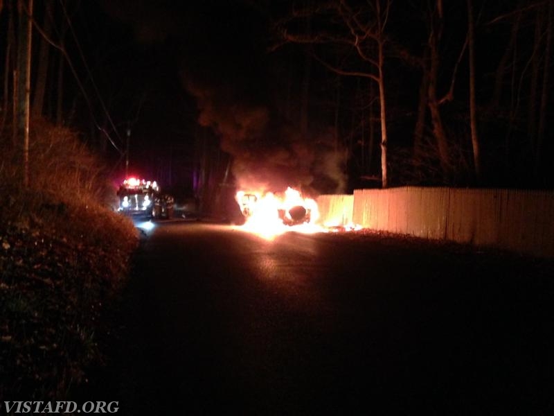 Vista Firefighters prepare to extinguish the fully involved car fire on Mill River Road - December 2015