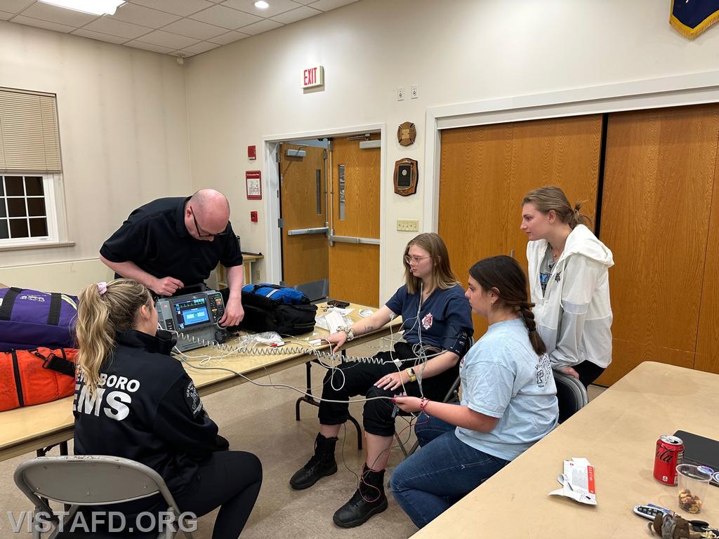Westchester EMS Paramedic Joel Demers going over the paramedic's equipment with Vista EMS personnel - 04/10/23