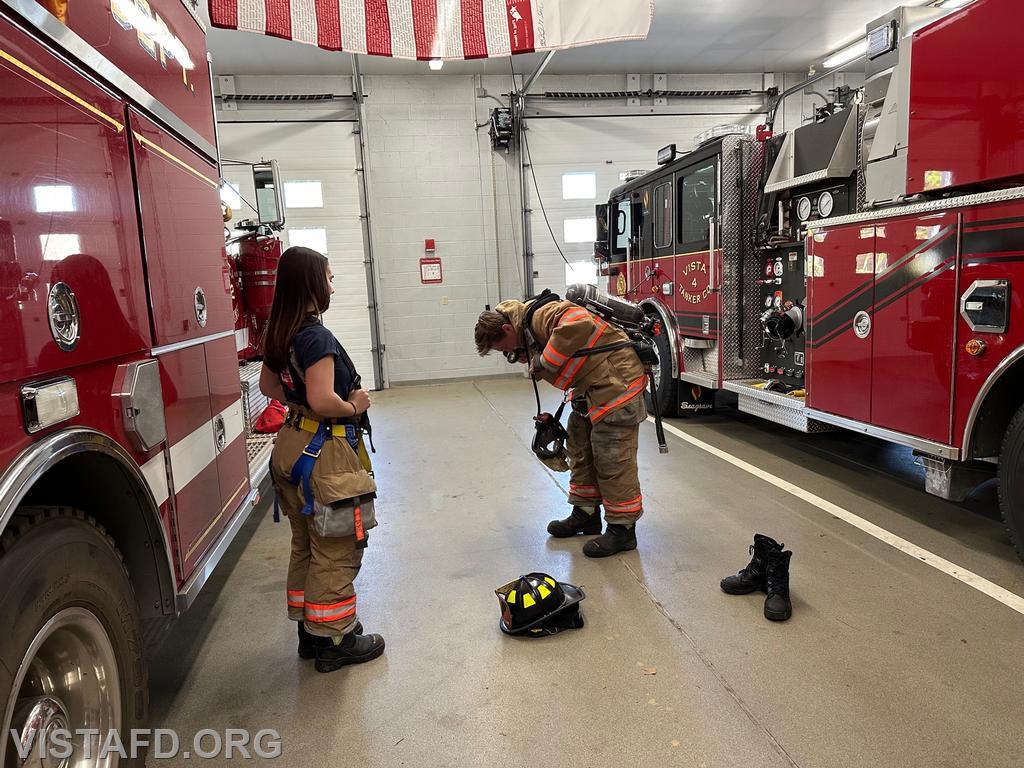 Probationary FF/EMT Ben Bo conducting a &quot;2-minute drill&quot; as Foreman Kyla Whalen looks on - 05/07/23