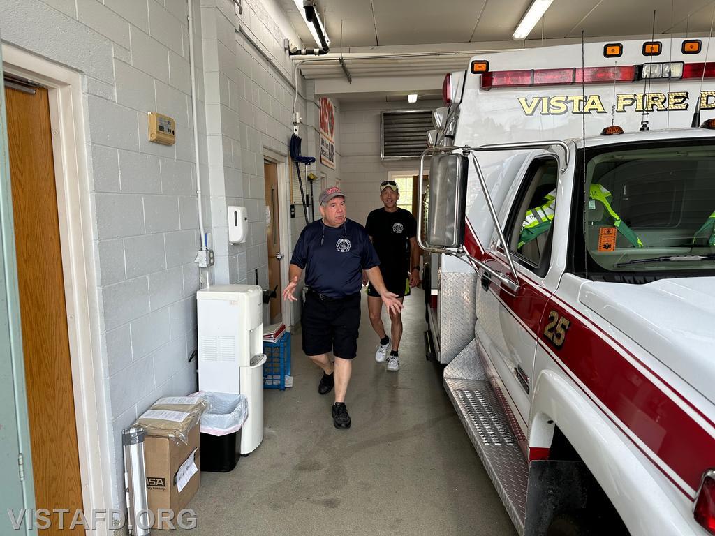 Foreman Brian Sferra and Probationary EMT Candidate Andy Korman conducting a walk around of Ambulance 84B2 before starting driver training - 06/11/23