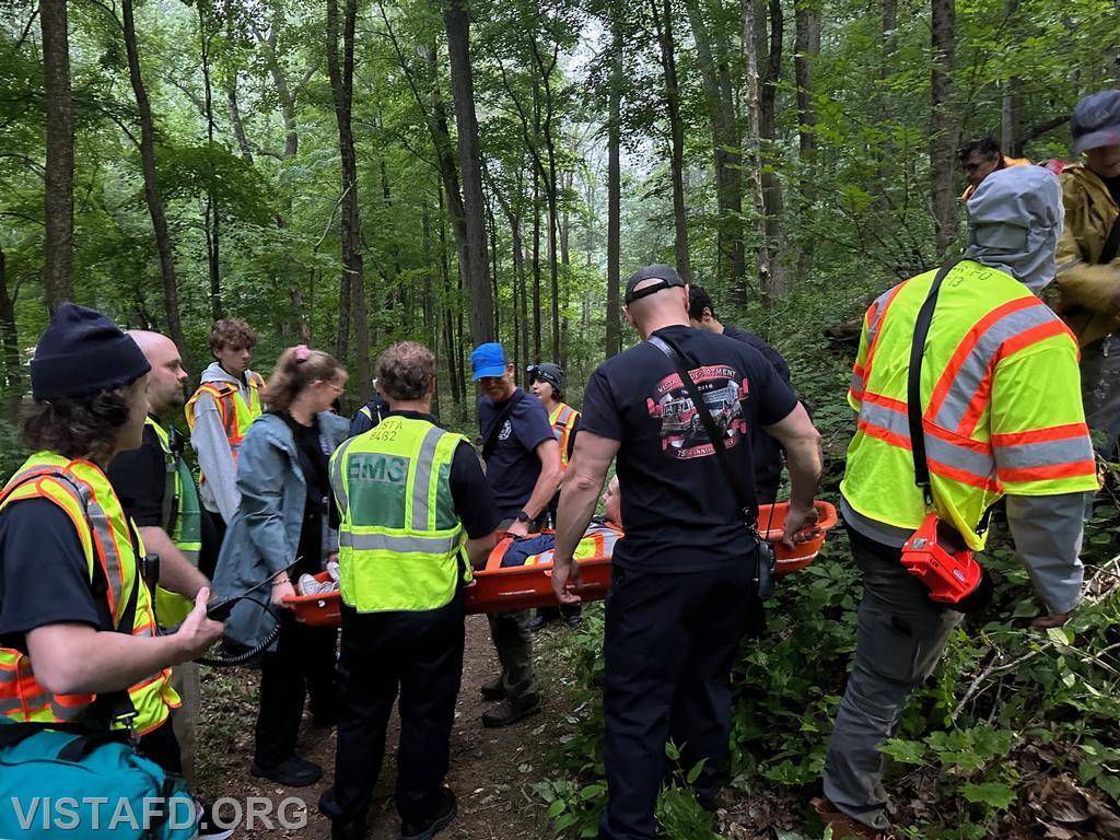 Vista Fire Department, South Salem Fire Department and Lewisboro Volunteer Ambulance Corps personnel extricating the hiker from the Leon Levy Preserve - 06/12/23