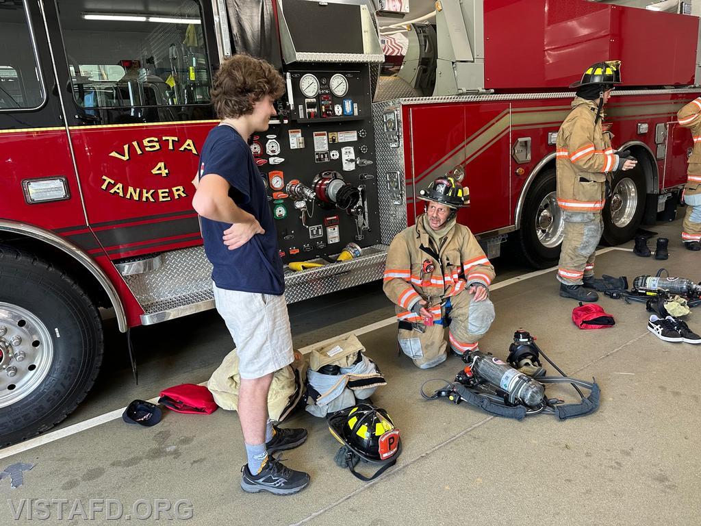 Firefighter Phil Katz going over the SCBA with Probationary Firefighter Ty Graygor - 07/23/23