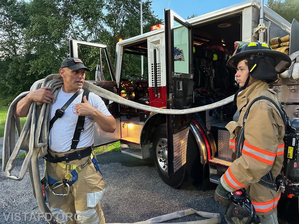 Captain Marc Baiocco going over how to stretch an 1-3/4&quot; hoseline with Probationary Firefighter Guillaume Pestie - 07/24/23