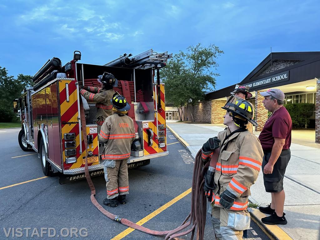 Firefighter Sean Kelly going over how to conduct an extended hoseline stretch - 08/14/23