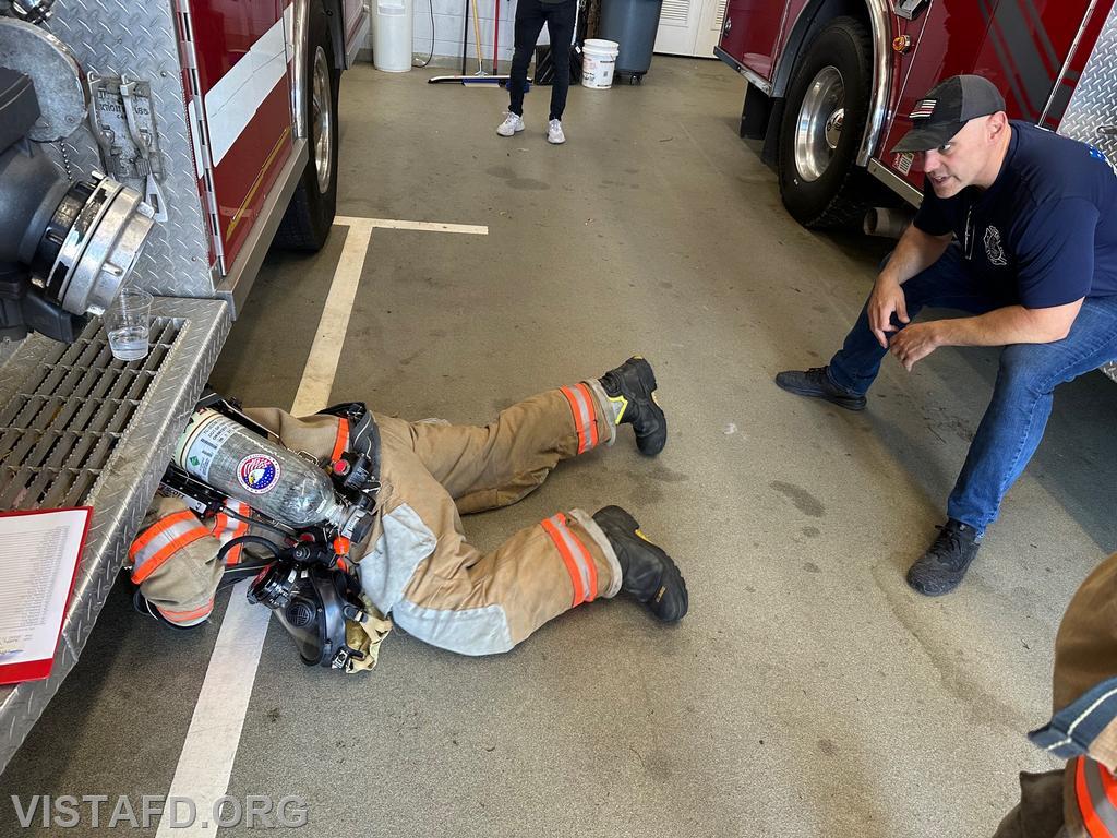 Probationary Firefighter Franco Compagnone conducting a low profile of an SCBA - 09/17/23