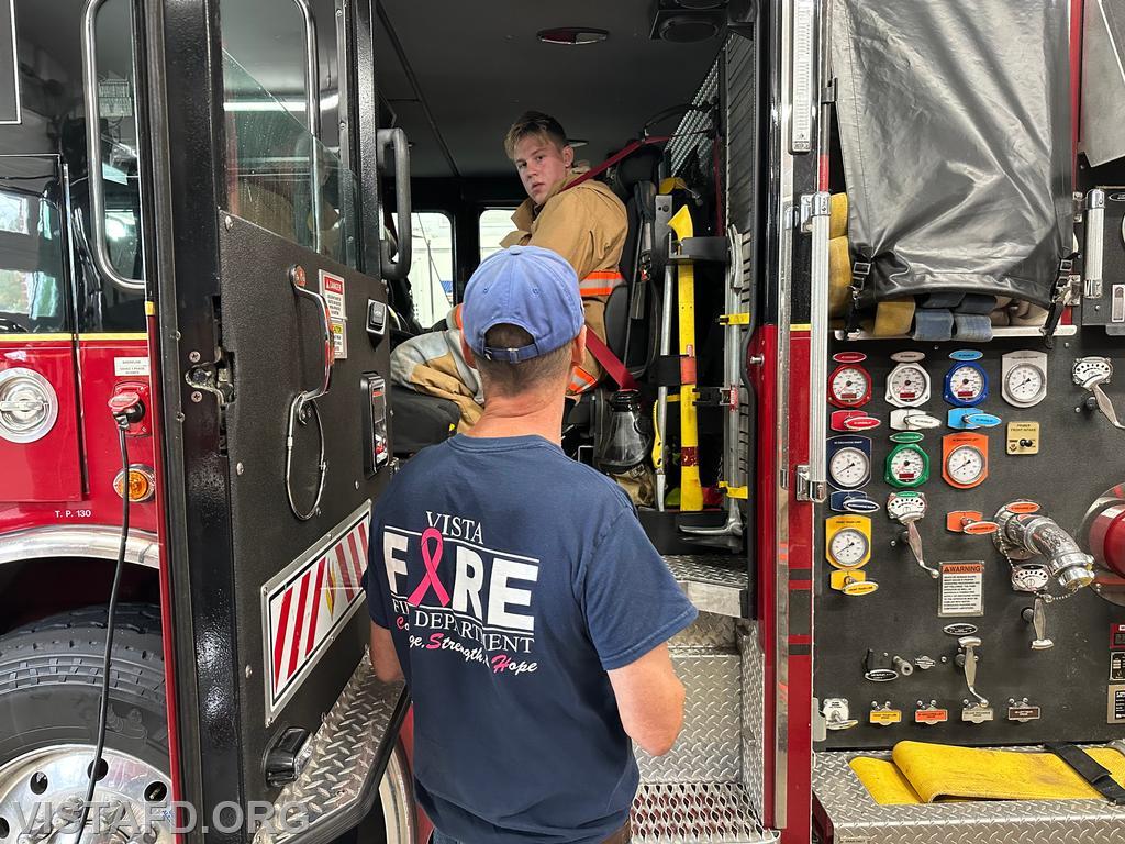 Firefighter Phil Katz going over how to properly mount/dismount an apparatus during an incident response with FF/EMT Ben Bo - 10/08/23
