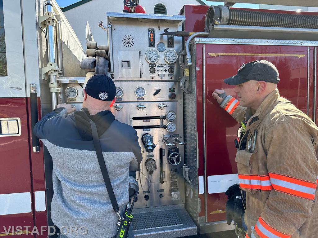 Captain Marc Baiocco going over how to pump Engine 143 with Probationary Firefighter Dan Hochman during &quot;Firefighter Skills Class&quot; - 03/24/24