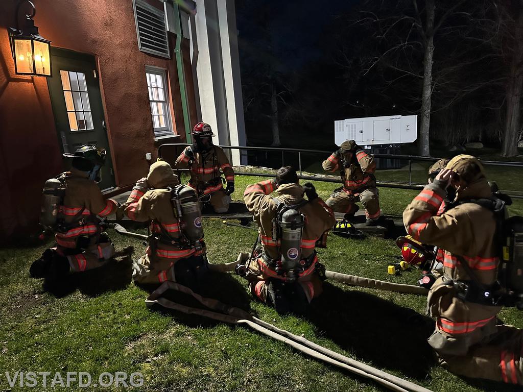Vista Firefighters preparing to enter the structure for the &quot;Hoseline Advancement & Pump Operations&quot; drill scenario - 03/25/24