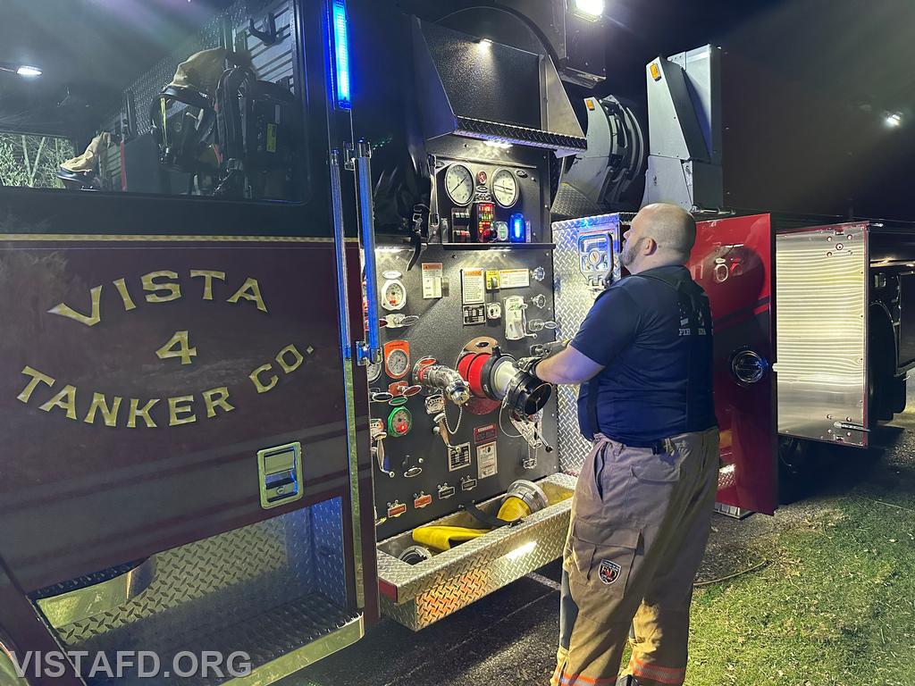 FF/EMT Ryan Huntsman operating the Tanker 4 pump panel during a hydrant service - 04/15/24