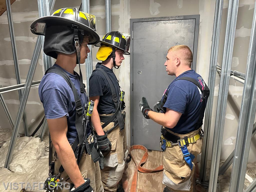 Lead Foreman Mike Peck going over extended stretch operations with Probationary Firefighter Ty Graygor and Firefighter Guillaume Pestie - 08/12/24