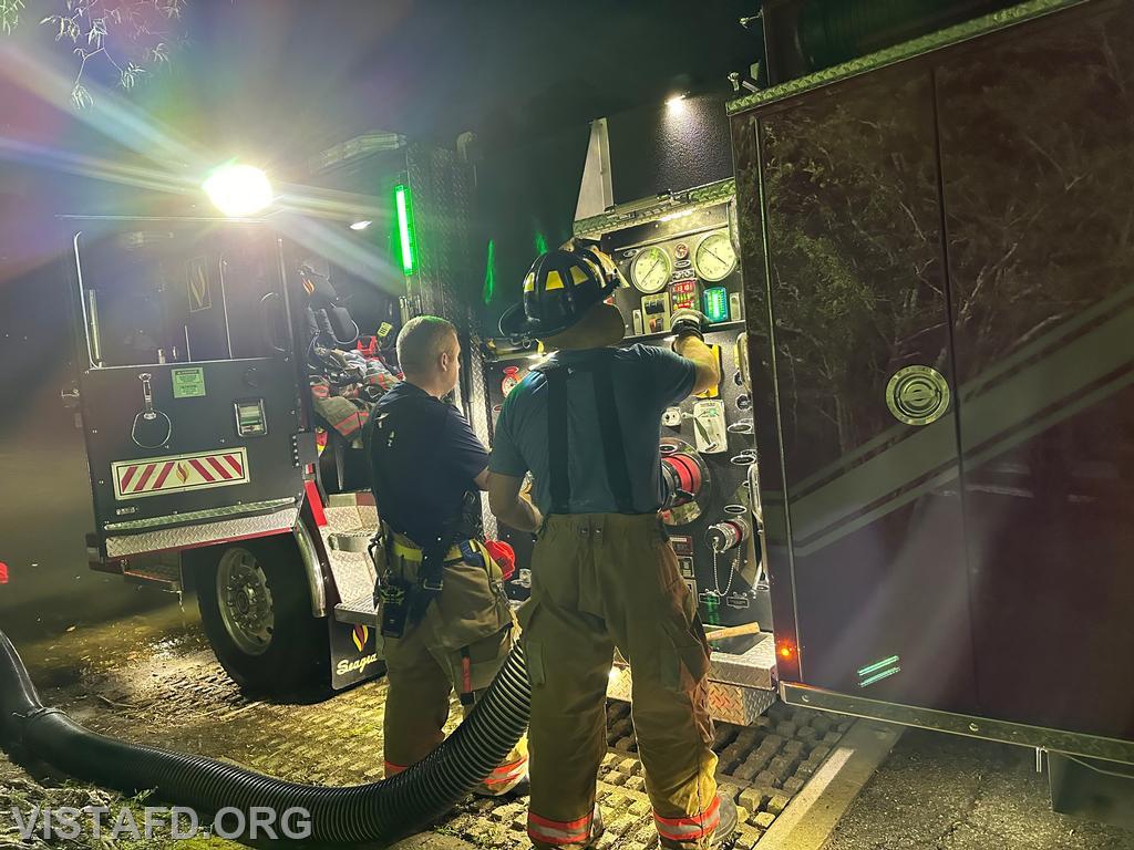 Lead Foreman Mike Peck and Probationary Firefigther Dan Hochman operating the Engine 141 pump panel during the &quot;tanker shuttle&quot; drill - 08/26/24