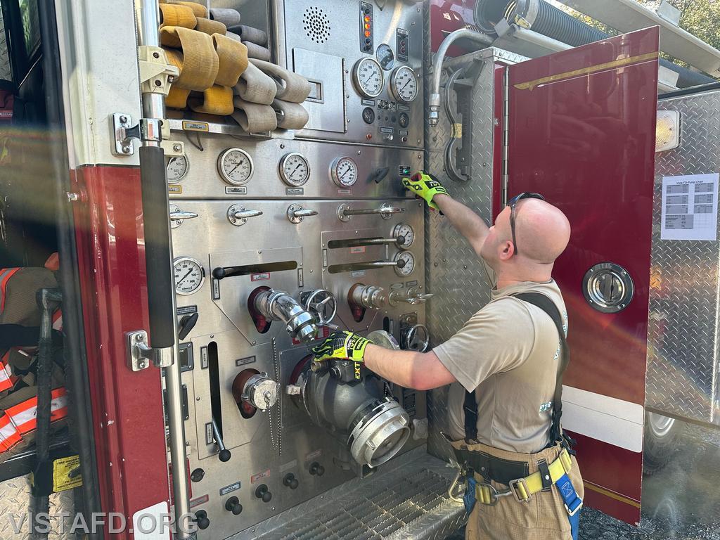 Foreman Ryan Ruggiero practicing how to operate the Engine 143 pump panel - 09/15/24