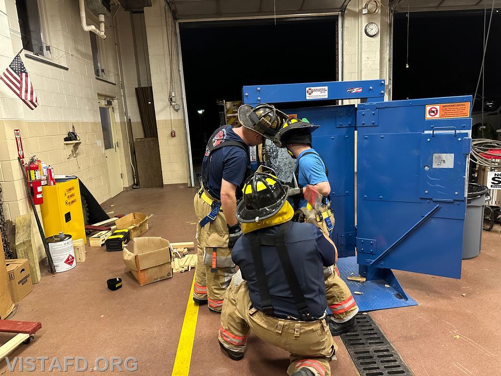 Vista Firefighters practicing forcible entry operations as Lead Foreman Mike Peck looks on - 09/16/24