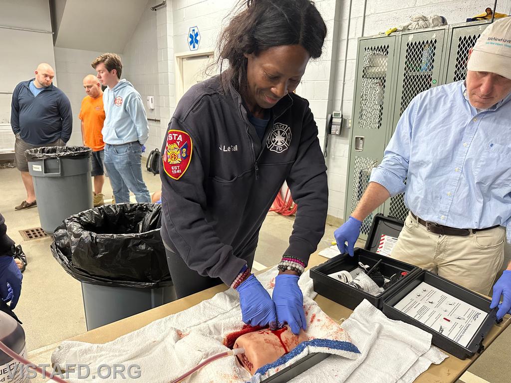 Firefighter Judith Le Gall going over how to pack a wound - 09/23/24