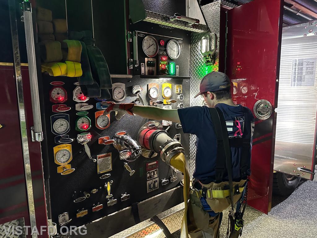 Mutual Responder Dom Mangone operating the Engine 141 pump panel during the hoseline advancement drill - 09/30/24