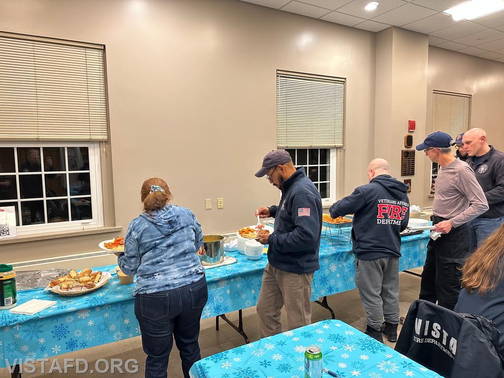 Vista Fire Department personnel enjoying dinner courtesy of our kitchen committee - 12/16/24