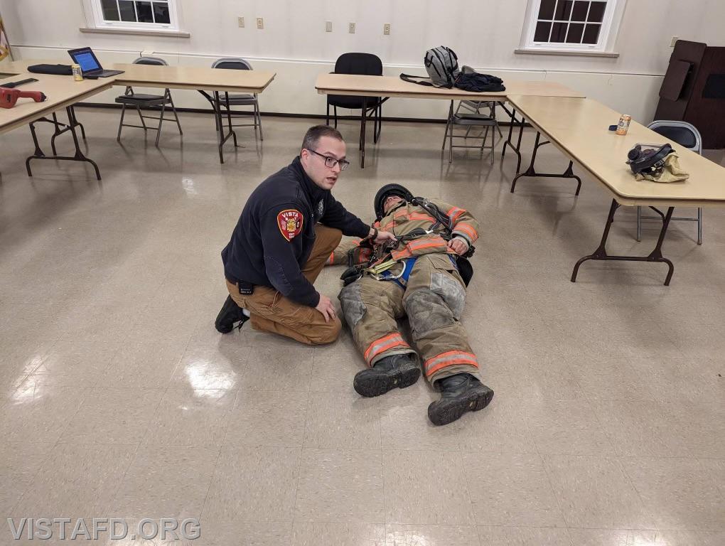 Assistant Chief Brian Porco going over how to package a downed firefighter - 04/17/23