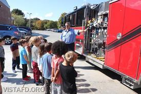 "Fireman Tom" giving a tour of Vista Engine 141 during "Fire Prevention Week" at Meadow Pond Elementary School (Photo courtesy of Katonah-Lewisboro School District)