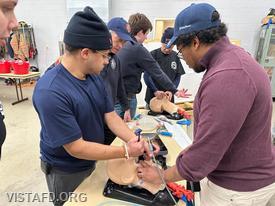 Vista Fire Department and mutual aid personnel learning about intubation equipment operations