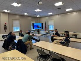 Captain Marc Baiocco leading a review of fire dynamics during the 'Firefighter Skills Class